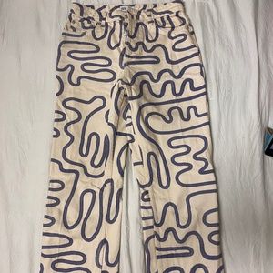white jeans with purple pattern